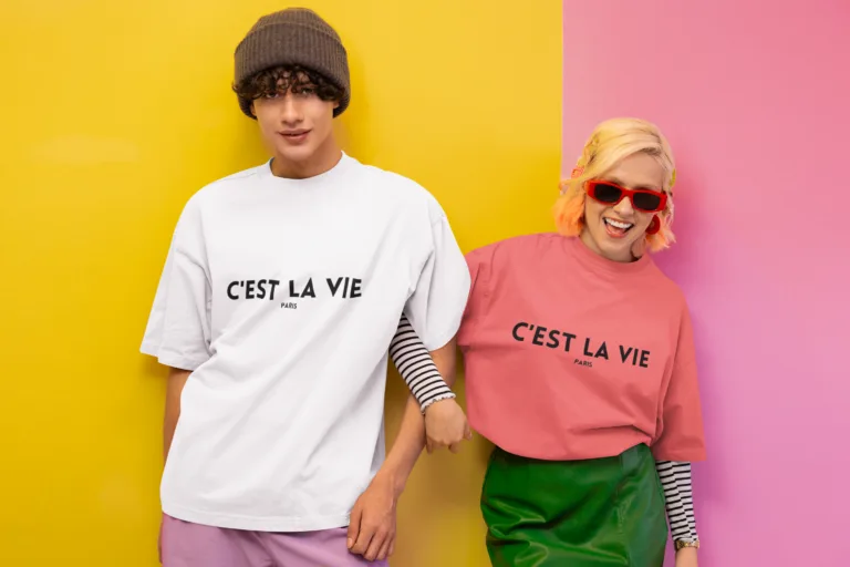 oversized t shirt mockup of a happy man and a woman posing in new pop wave inspired setting m38761 1