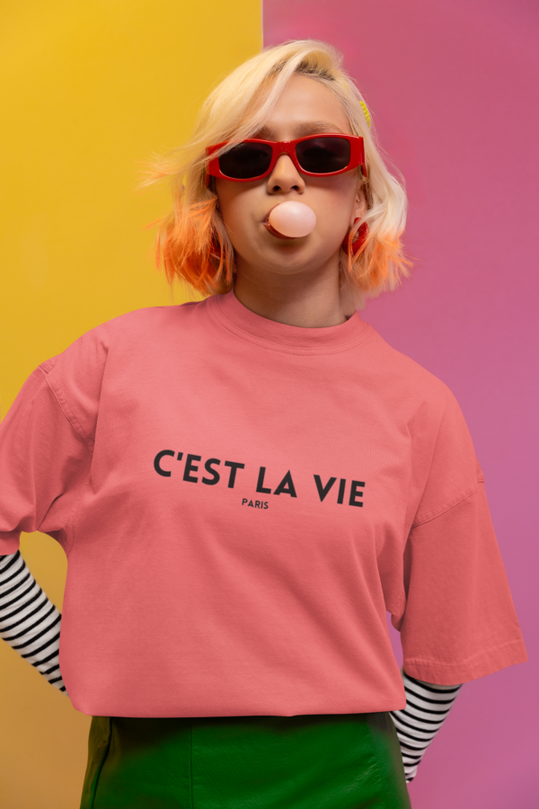 oversized tee mockup of a woman making a bubble gum in a new pop wave inspired setting m38757 1