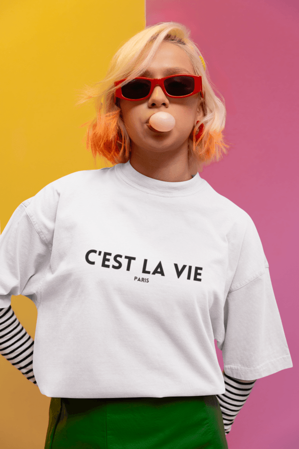 oversized tee mockup of a woman making a bubble gum in a new pop wave inspired setting m38757